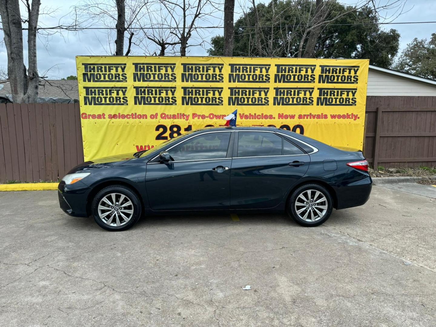 2016 Toyota Camry (4T1BF1FKXGU) , located at 16710 Clay Rd., Houston, TX, 77084, (281) 859-7900, 29.834864, -95.656166 - Photo#0